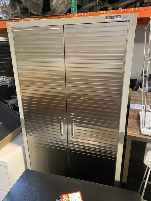 Metal storage cabinet on casters