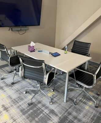 white laminate conference table with chrome post legs