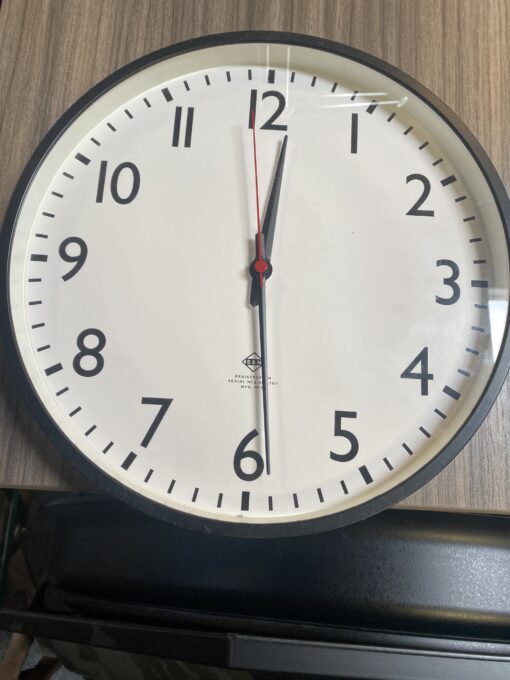 small wall mounted clock