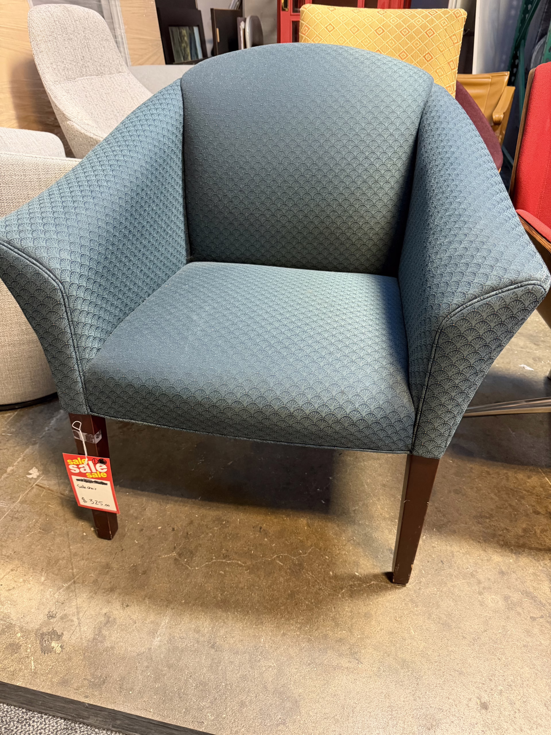teal patterned fabric side chair