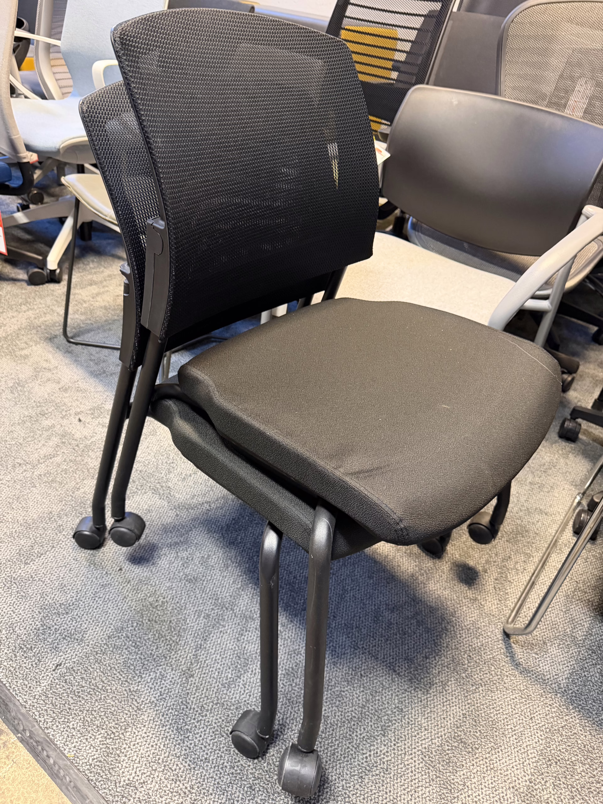 armless stacking chairs on casters