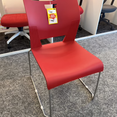 red sit on it stacking chairs