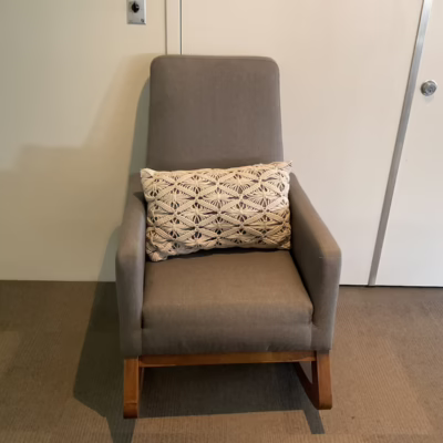 grey fabric rocking chair