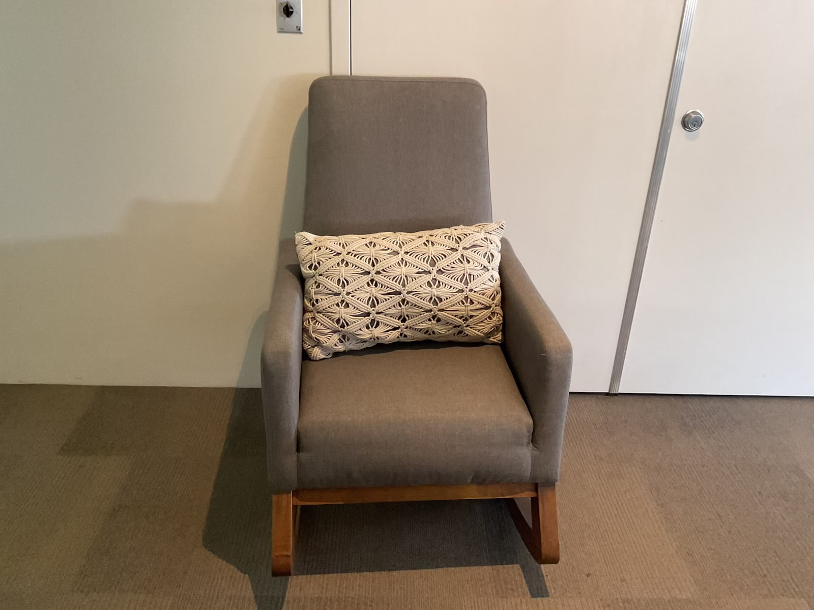 grey fabric rocking chair