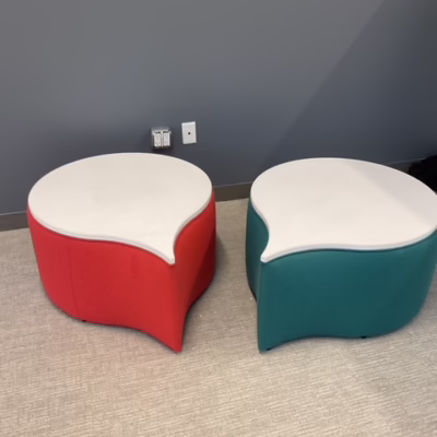 Apostrophe shaped ottoman tables