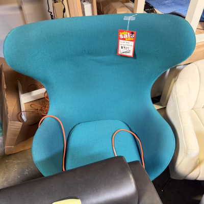 teal fabric club chairs with swivel base